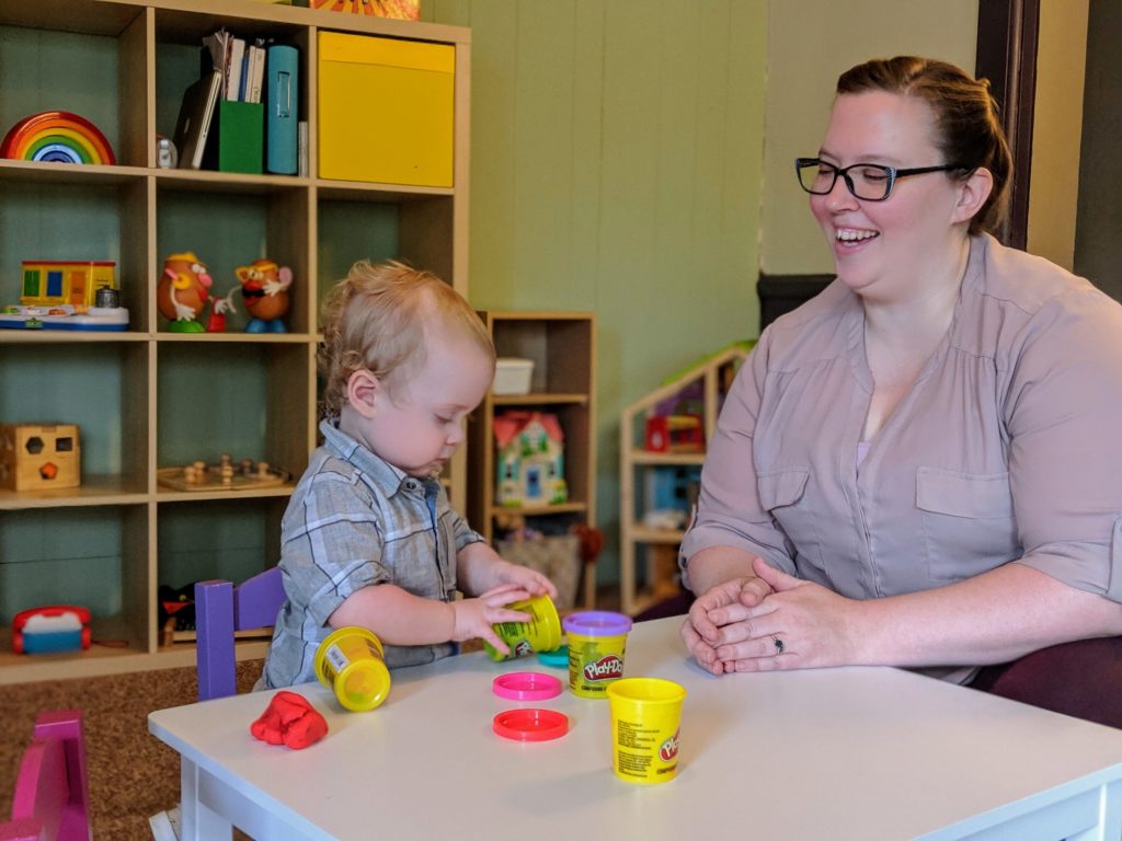 Beth and her son play with Play-doh.